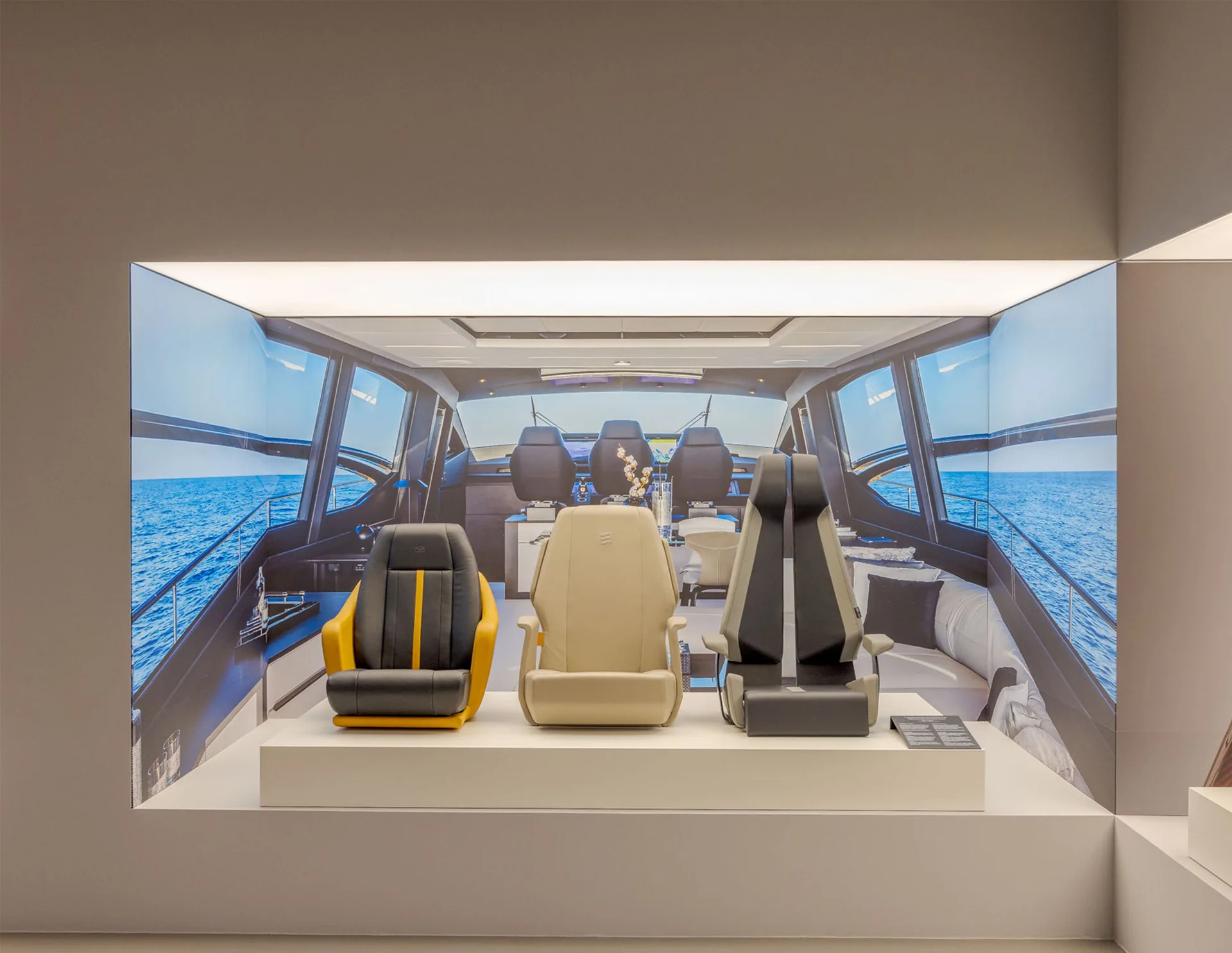 Poltrona Frau In Motion installation: three seats in a display at the Poltrona Frau Museum